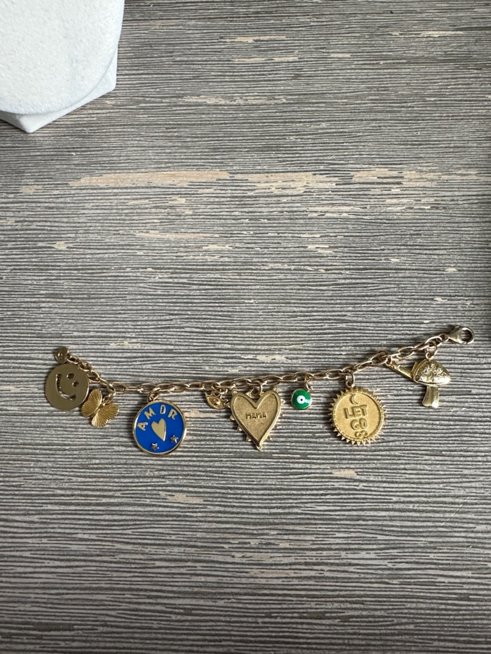 HART Gold Charm Bracelet with 9 charms.
